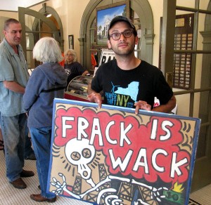 Josh admires the local signage. Photo by Helen McLean